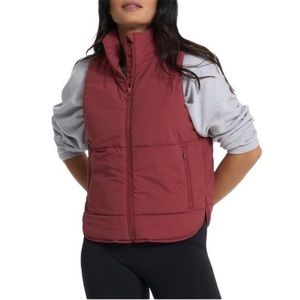 Vuori Women's Canyon Insulated Vest in currant (rust red)